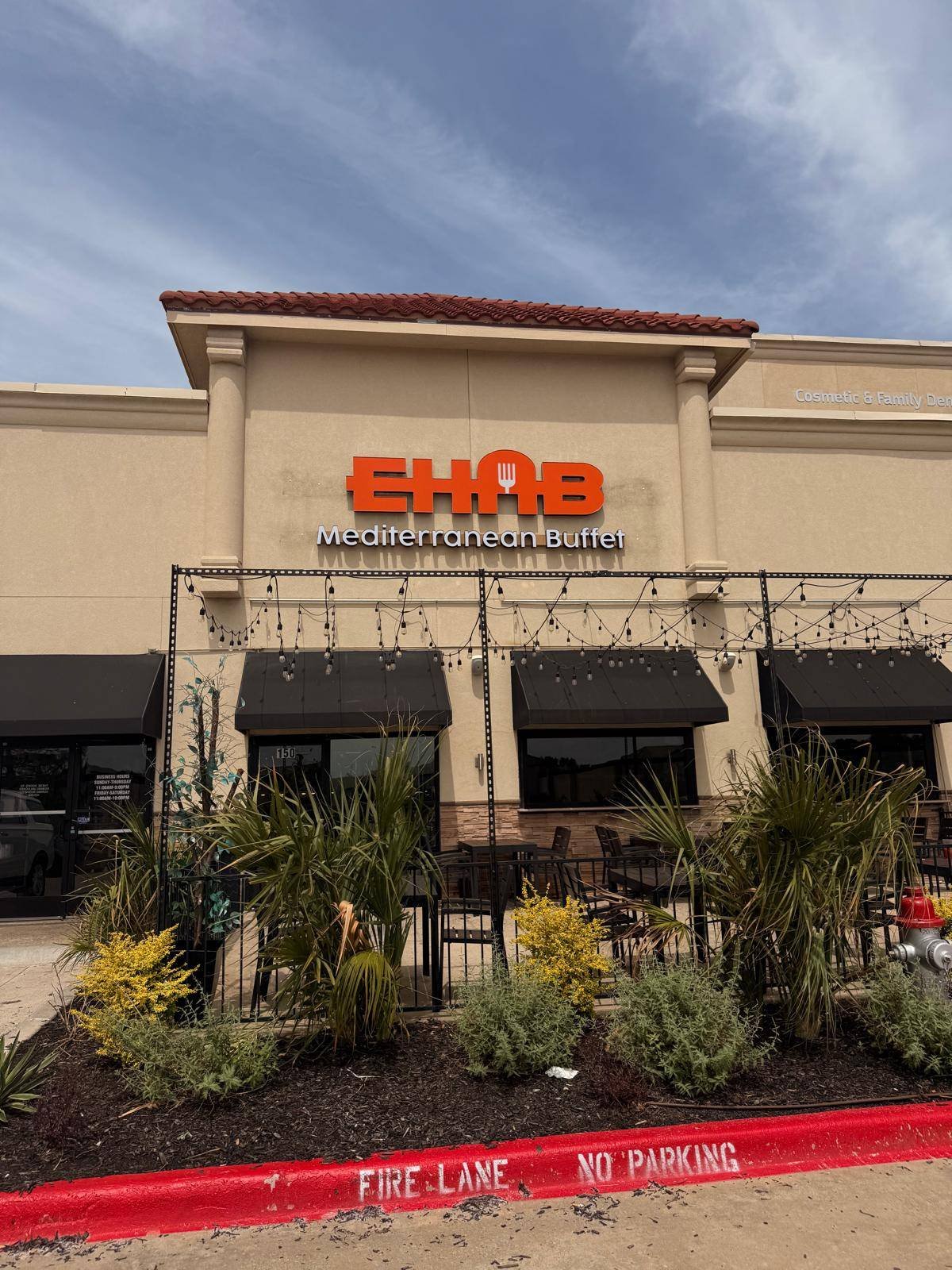 Entrance and outdoor patio seating at Ehab Mediterranean Buffet